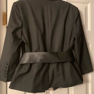 Fully lined, belted suite jacket with hidden button detail